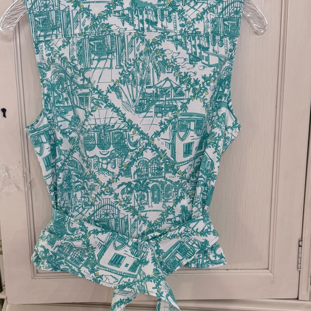 VTG RARE LILLY PULITZER WRAP SHIRT Size 10
Worth Ave pattern like new - Picture 4 of 8